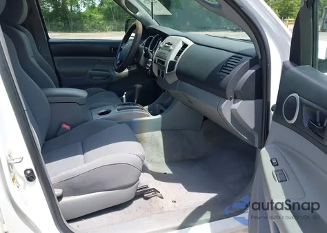 2009 Toyota Tacoma Base V6 из США, поврежденный, VIN 3TMLU42N29M037059